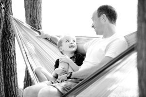 man and child in hammock
