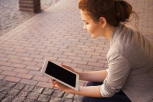 woman with ipad