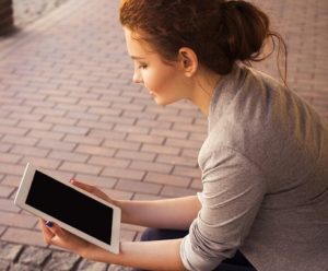 woman with ipad