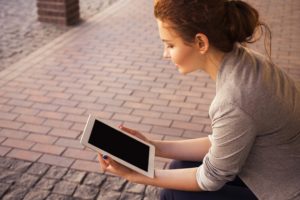 woman with ipad