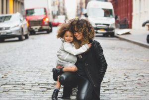 woman and child in street