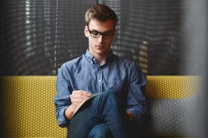man with notebook